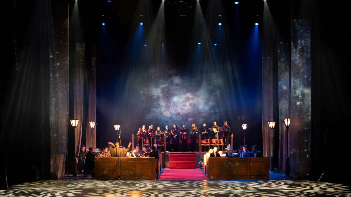 Orchestra and choir performing in the baroque-styled Hybernia Theatre