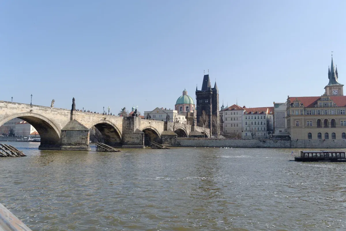 Charles Bridge and the Old Town skyline seen from the Vltava on a clear day